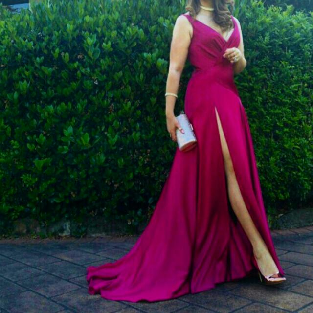 fame and partners red dress