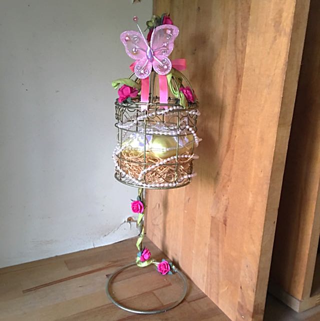 Bird cage hotsell ring holder