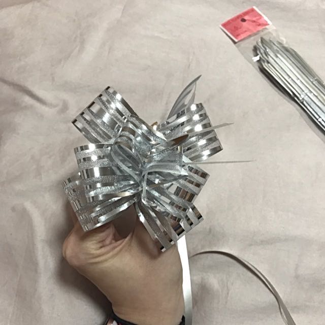 Silver Pull Ribbons (10pcs) (Category: Craft Supplies & Tools) located in Singapore. Submitted by small.tomato (Listing ID 85641890, Image 1). Description: .
