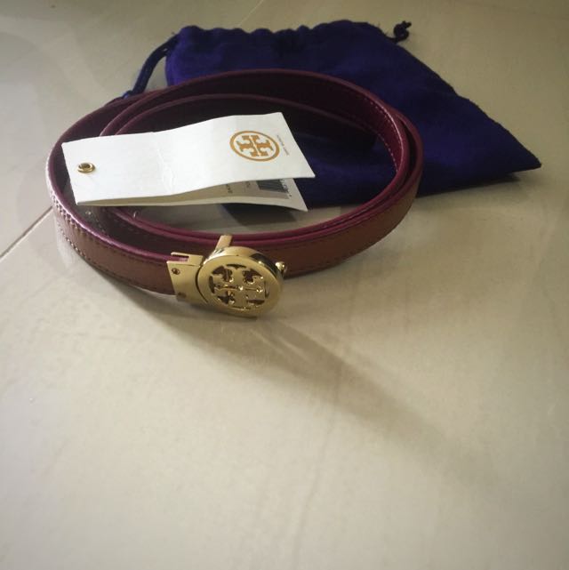 Tory Burch Skinny Rotating Logo belt At $120, Luxury, Accessories on  Carousell