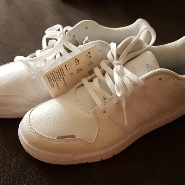 white adidas school shoes