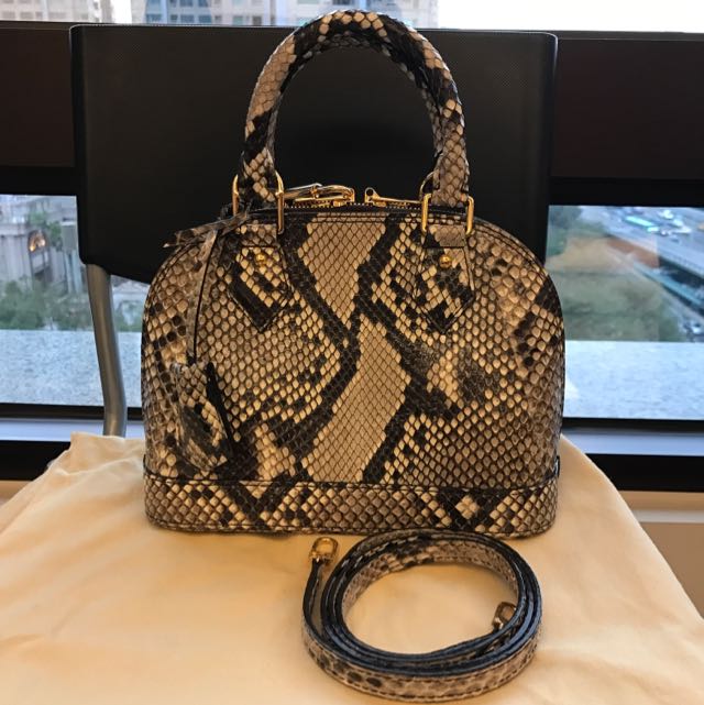 lv蟒蛇皮两用包