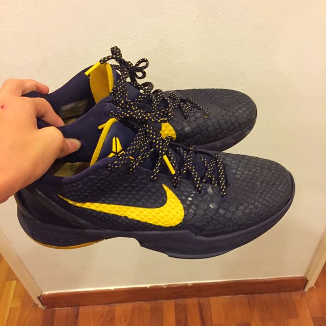 kobes shoes black and white