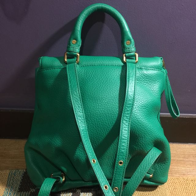 green leather backpack