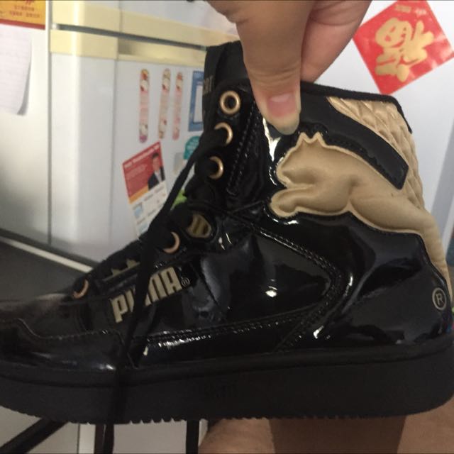 black and gold puma high tops