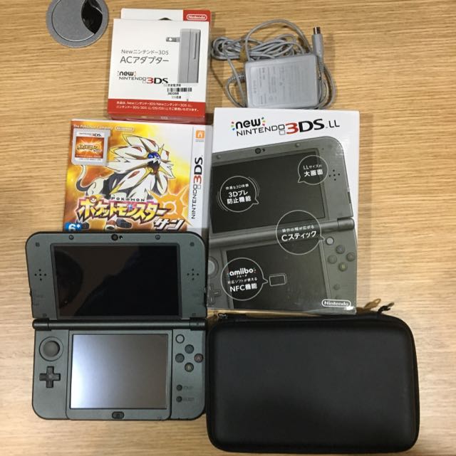 日版new 3ds Ll 9 5新and原廠充電器and神奇寶貝太陽 電玩 電玩主機在旋轉拍賣