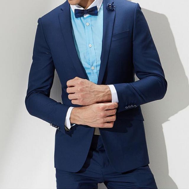 light blue shirt with blue suit