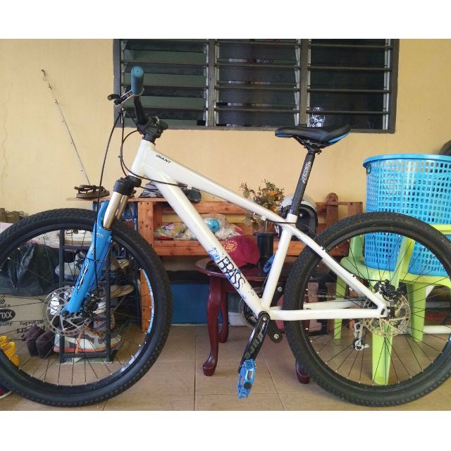 Giant brass bike on sale