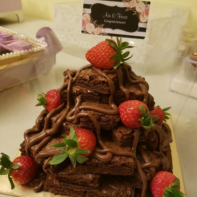 Brownie Tower (Category: Homemade Bakes) located in Singapore. Submitted by perfectfrosting (Listing ID 89871021, Image 2). Description: Chocolate Fudge Brownie Tower Suitable for any occasion! (Birthday/Anniversary/Engagement/Hantaran) 25 pcs (incl of nutella drizzle) Call / Whatsapp 91052075 to place order!.