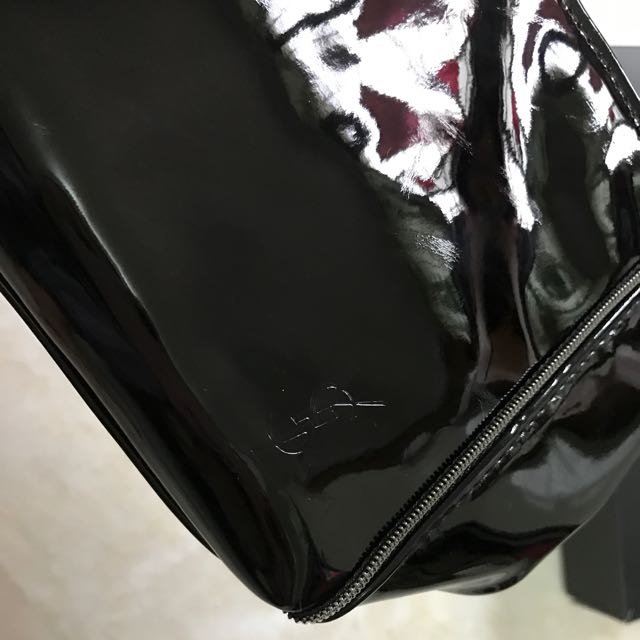 YSL makeup pouch, Women's Fashion, Bags & Wallets, Purses & Pouches on  Carousell