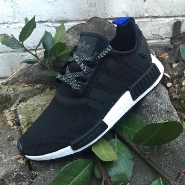 Nmd core black outlet blue tab