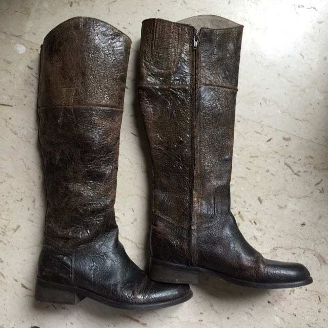 Distressed Leather Boots (Category: Boots) located in Singapore. Submitted by jot366 (Listing ID 92343748, Image 1). Description: Hardly worn. Knee length real leather special distressed finish, dark brown. Soles are also leather.