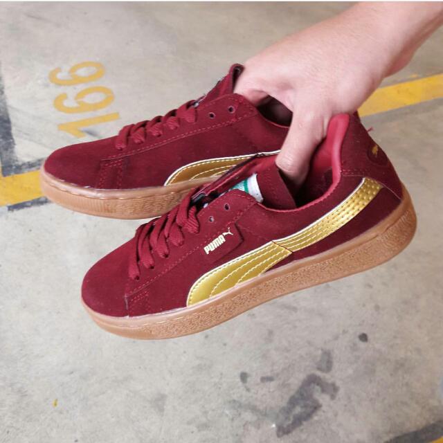 maroon and gold pumas