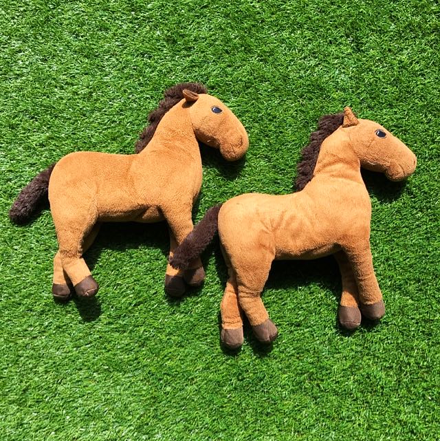 A Pair Of Ikea Soft Toy Horses
