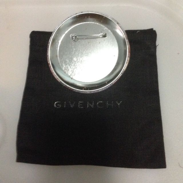 Givenchy (Category: Accessories) located in Singapore. Submitted by yeowel374 (Listing ID 94536178, Image 3). Description: Original givenchy badges a star and sun stripes symbols with givenchy logo behind by Ricardo Tisci. Comes with dust bag. One is in mint condition the other slightly used behind. Reduced from 150-120. Hurry while stock last..