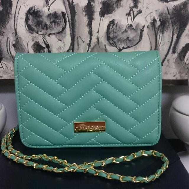 Bebe new arrivals green purse