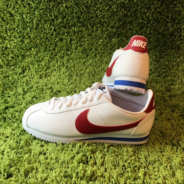nike white sneakers with red tick