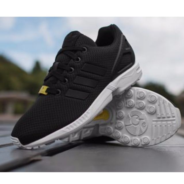 black adidas flux size 6