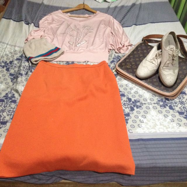 Pastel pink top from Boardwalk and orange skirt from Saint Joie on ...