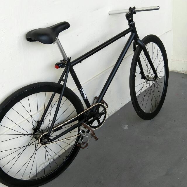 orange 24 inch bike