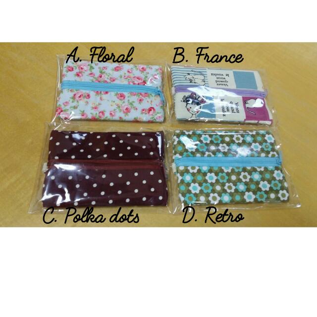 Multi-purpose Zip Pouch (Category: Purses & Pouches) located in Singapore. Submitted by xjanex (Listing ID 96887101, Image 1). Description: Useful and cute at the same time. Use it to keep tissue packs or sanitary pads. Size: ~10 x 14 cm. With a cloth strap. NEW. Comes packed in a clear plastic cover. Available in 4 designs, only 1 pc each. A. Floral - SOLD B. France - SOLD C. Polka dots D. Retro - SOLD Meet up at Kent Ridge or Buona Vista MRT or