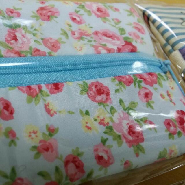 Multi-purpose Zip Pouch (Category: Purses & Pouches) located in Singapore. Submitted by xjanex (Listing ID 96887101, Image 2). Description: Useful and cute at the same time. Use it to keep tissue packs or sanitary pads. Size: ~10 x 14 cm. With a cloth strap. NEW. Comes packed in a clear plastic cover. Available in 4 designs, only 1 pc each. A. Floral - SOLD B. France - SOLD C. Polka dots D. Retro - SOLD Meet up at Kent Ridge or Buona Vista MRT or