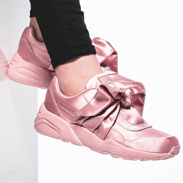 pink puma sneakers with bow