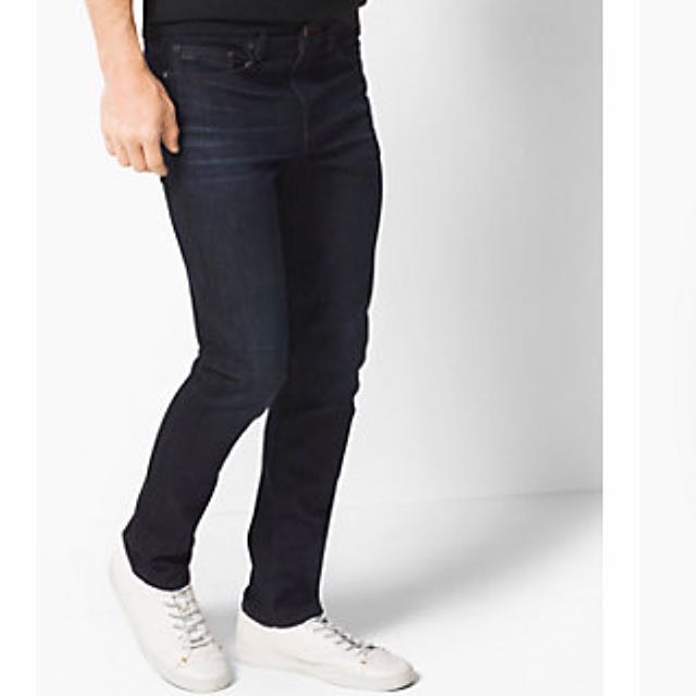 MICHAEL KORS Men's Tailored-Fit Jeans, Men's Fashion, Bottoms, Jeans on  Carousell