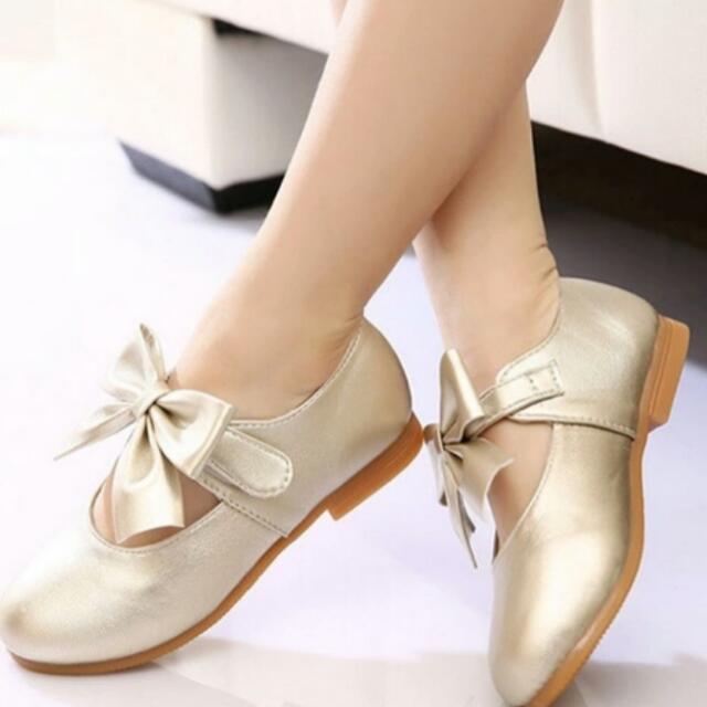 girls flat gold shoes