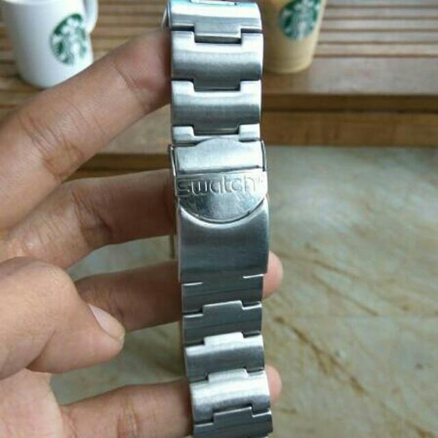 tali jam swatch irony
