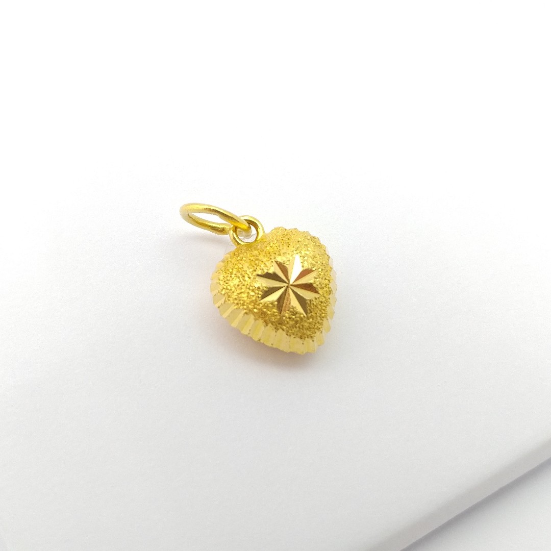 Heart shape gold dollar 2025