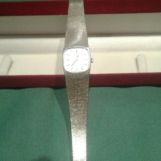 Omega white hotsell gold watch