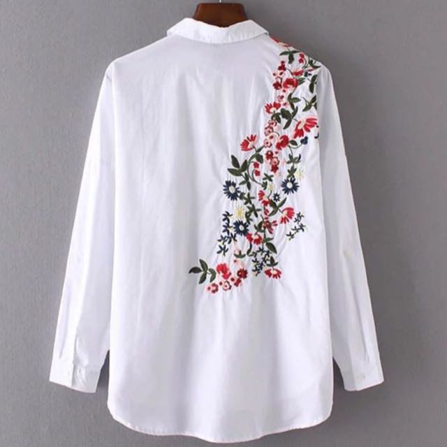 white baggy long sleeve top
