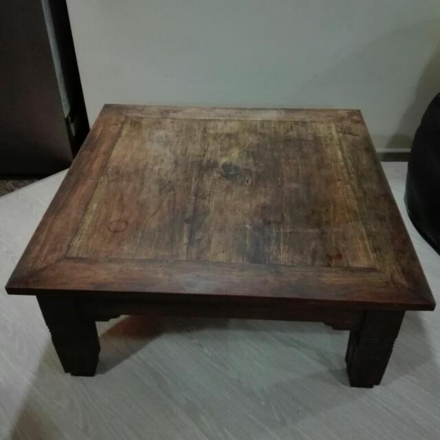 Solid Teakwood Table (Category: Tables & Sets) located in Singapore. Submitted by lanmega (Listing ID 100087419, Image 1). Description: Condition: 9/10 Need to re-vanish and 1 of the handle is missing. Dimension: 98cm x 98cm Can nego and self collection. .