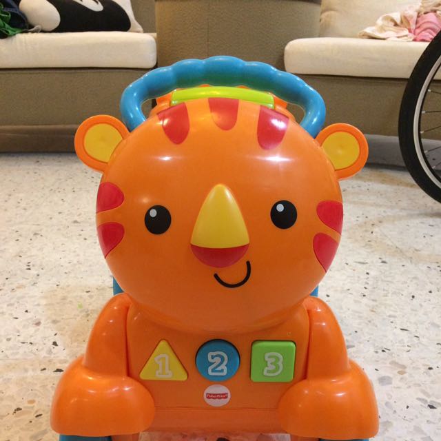 Fisher price stride to ride musical tiger 2025