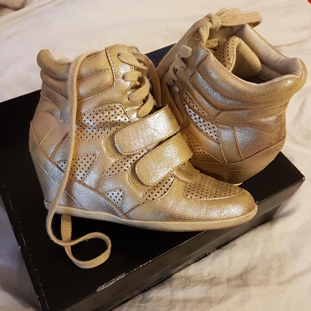 gold high top wedge sneakers