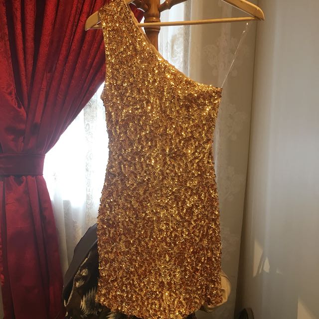 Gold toga dress store