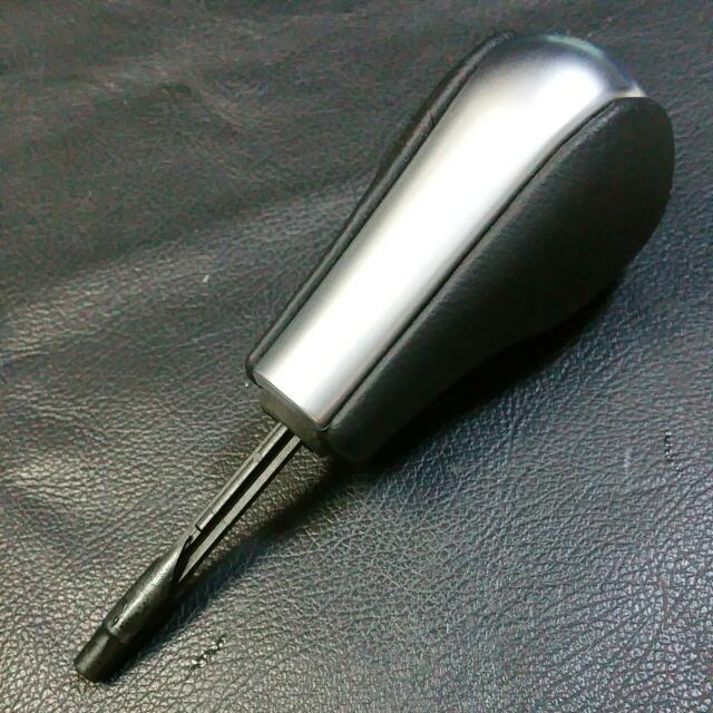 Automatic Shift Knob (Category: Interior Styling & Trim) located in Singapore. Submitted by no.frills (Listing ID 101535818, Image 1). Description: Near new (99% new) scratch free on the metallic surface (see photos). Leather in perfect condition. Taken from E9x BMW when new. Not a straight forward DIY if cross to other platforms as it might involve some trimming of the shifter stick. Non negotiable, let lest low ball. Thank you for looking. Chee