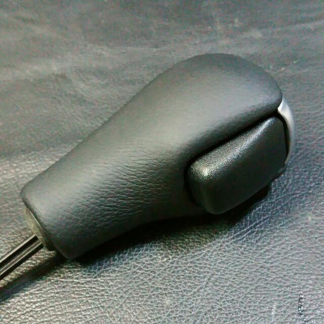 Automatic Shift Knob (Category: Interior Styling & Trim) located in Singapore. Submitted by no.frills (Listing ID 101535818, Image 2). Description: Near new (99% new) scratch free on the metallic surface (see photos). Leather in perfect condition. Taken from E9x BMW when new. Not a straight forward DIY if cross to other platforms as it might involve some trimming of the shifter stick. Non negotiable, let lest low ball. Thank you for looking. Chee