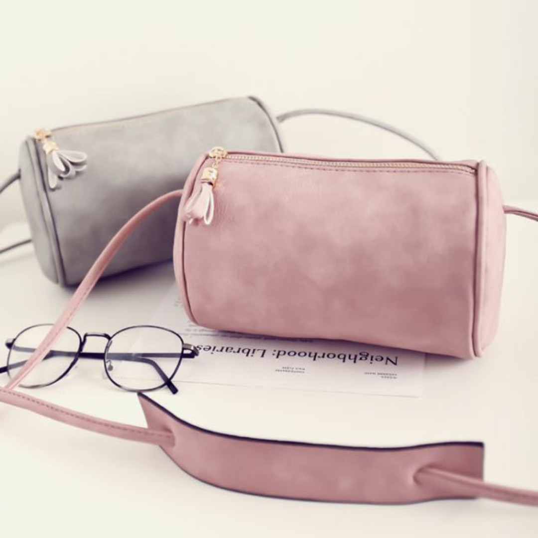 cylindrical sling bag