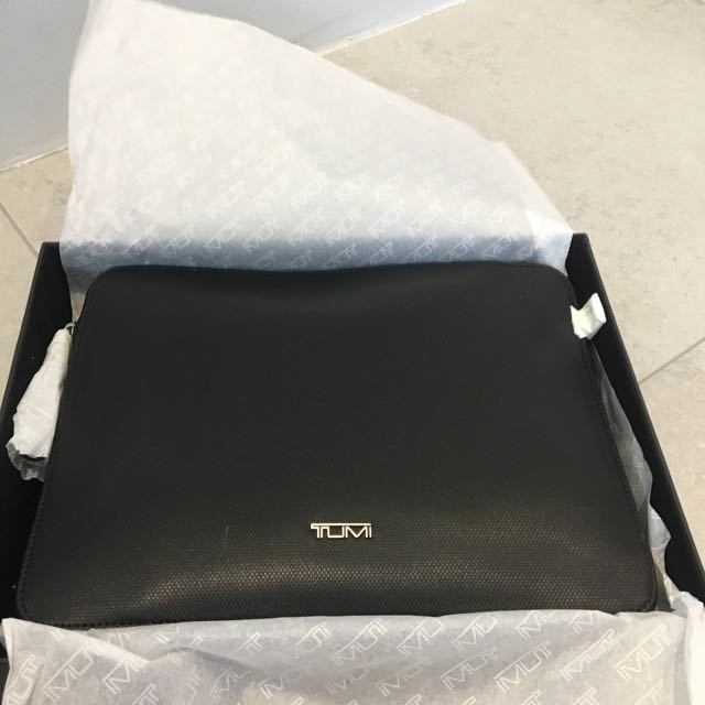 tumi slim messenger bag