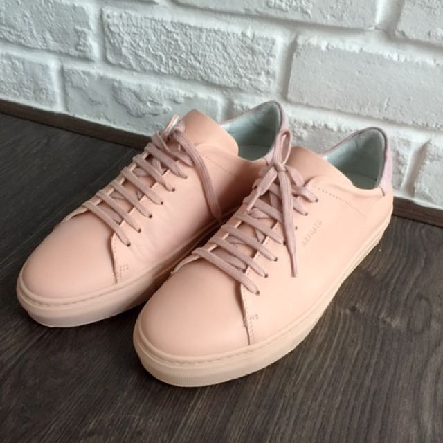 axel arigato pink sneakers