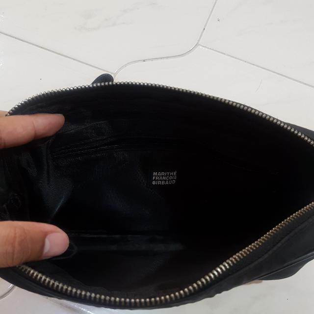 Girbaud sling hotsell bag