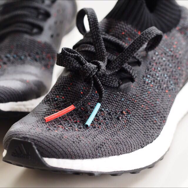 Ultra boost uncaged multicolor black top