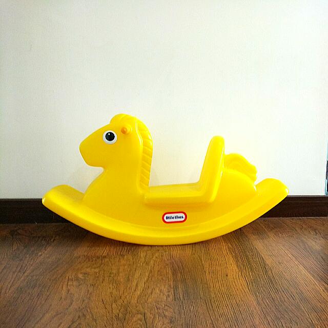 Yellow shop rocking horse