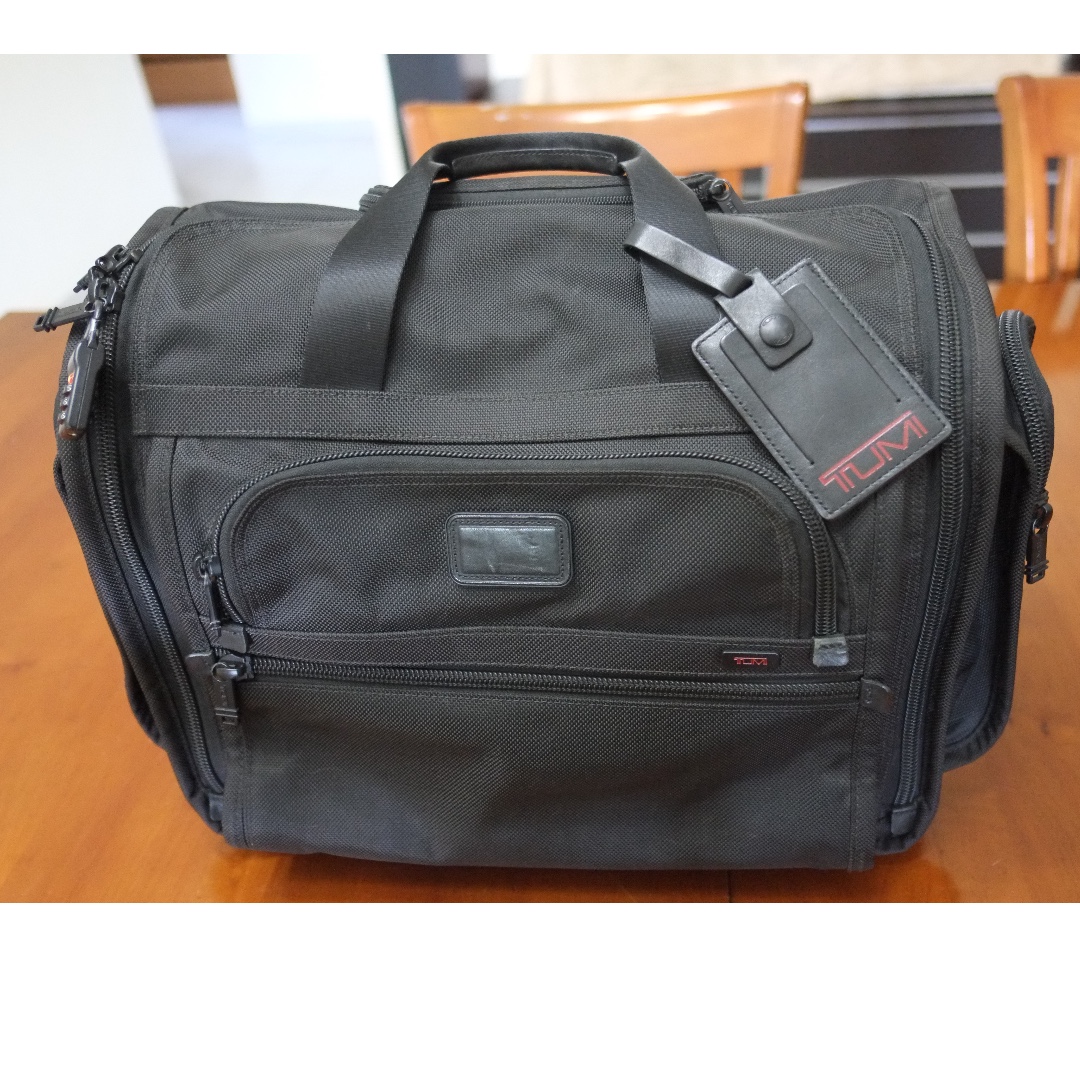 tumi overnight bag with wheels