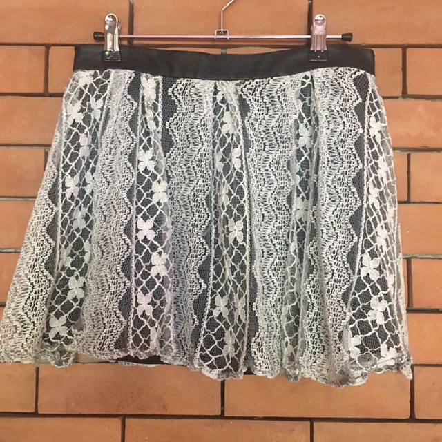 BCBG Flowy Lace Skirt (Category: Skirts) located in Marikina City. Submitted by kooxwears (Listing ID 103466840, Image 1). Description: Size Small ❗️Has a little damage on the synthetic leather design but not really seen (check last pic)❗️.
