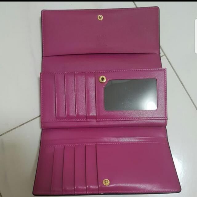 Mcm wallet on sale price