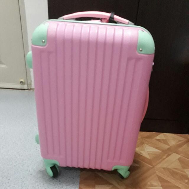 Pink and green luggage with wheels best sale