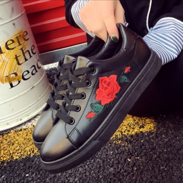Shoes with roses on them top